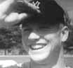Mickey Mantle tips his cap during spring training in 1956.
