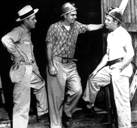 Mickey Mantle with his dad, Elvin "Mutt" Mantle (left) and fellow ballplayer Cliff Mapes (center) at a lead mine in Oklahoma after Mickey's rookie season, 1951.